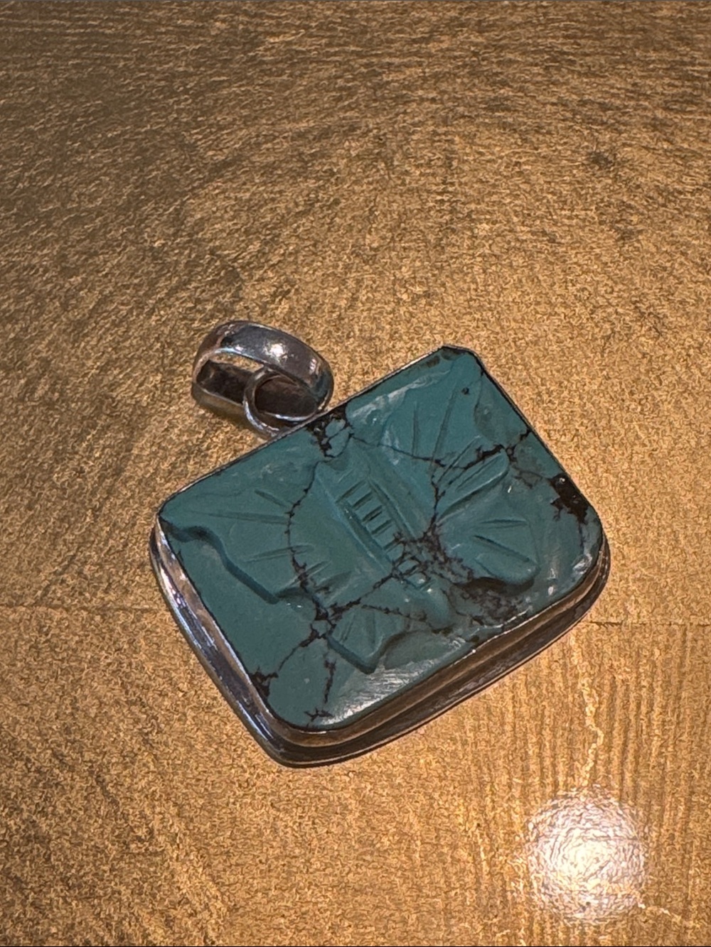 Carved Turquoise Butterfly Pendant in Sterling Frame